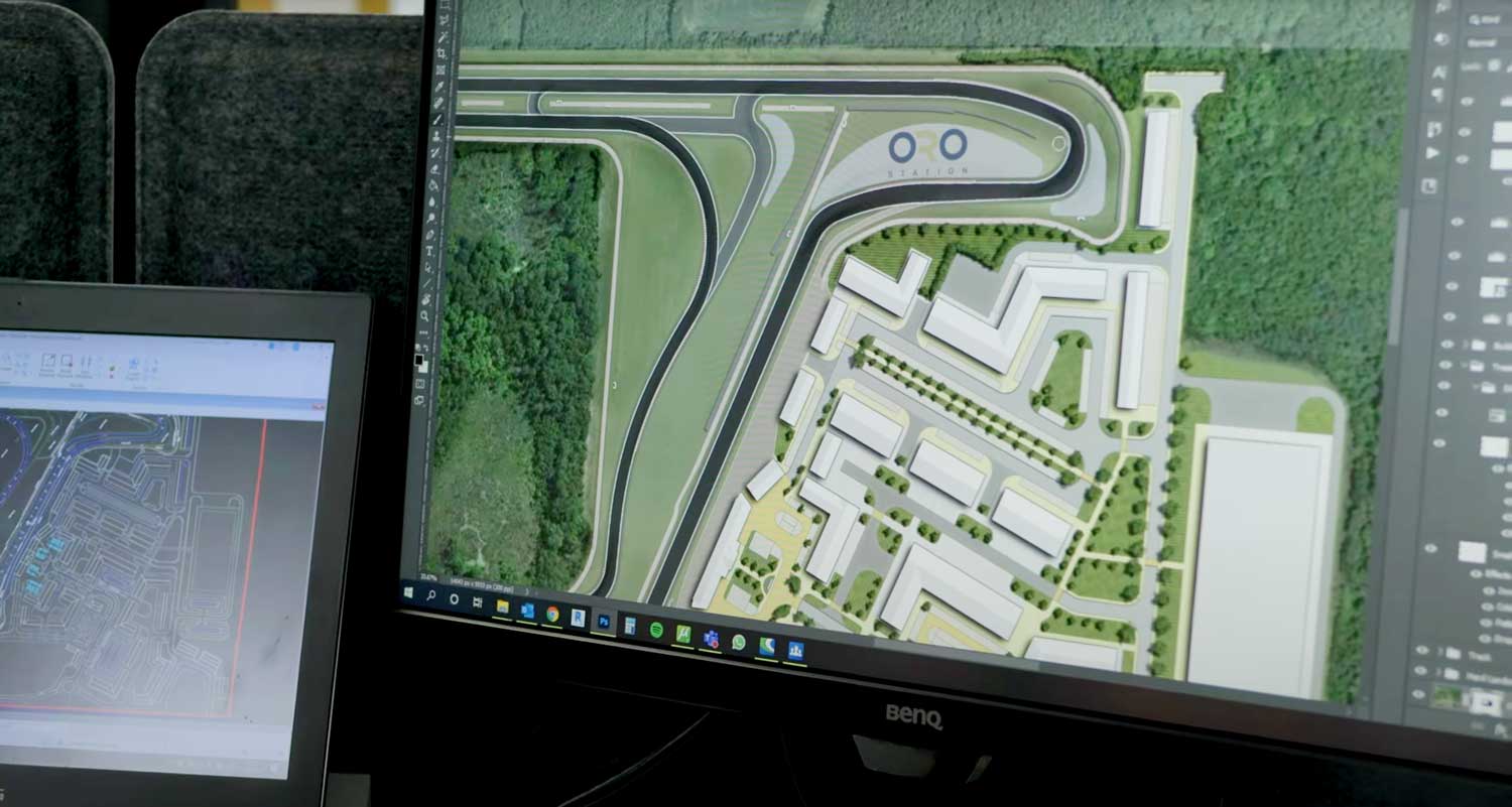 a computer screen displaying the CAD design of a race track